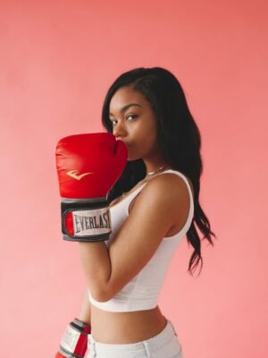 Photo Of Woman Wearing Red Boxing Gloves